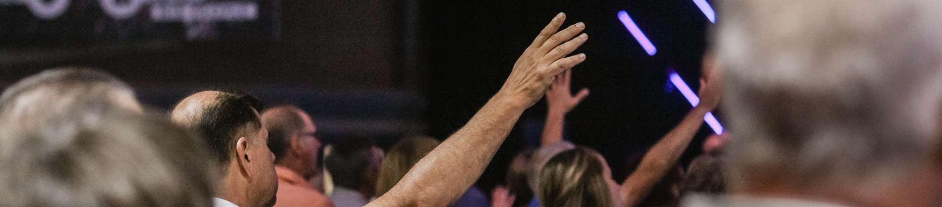 A man worshipping with his hands in the air A man worshipping with his hands in the air
