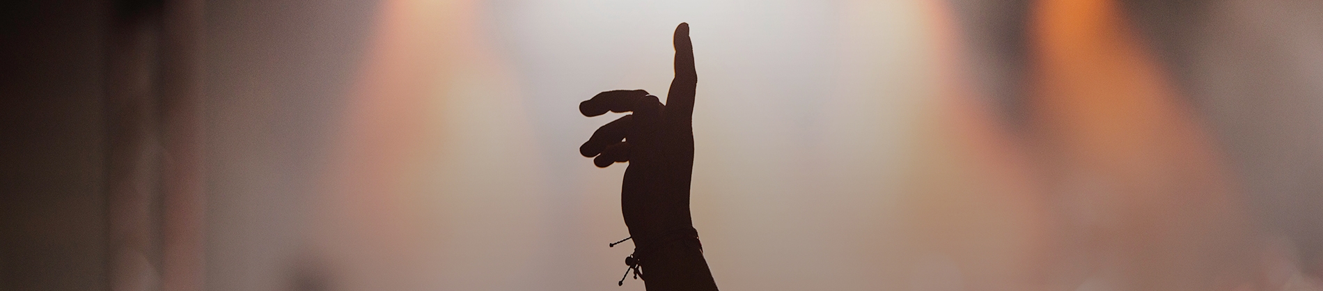 A women pointing in the air A women pointing in the air
