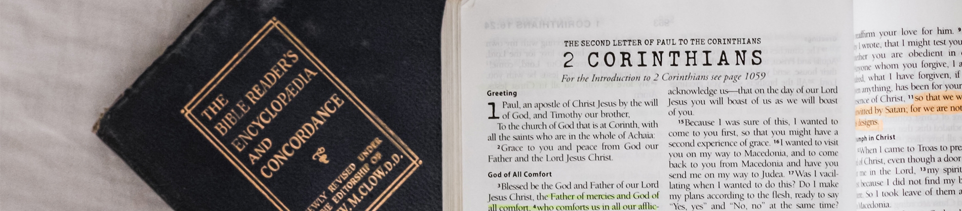 A bible Encyclopaedia and open bible A bible Encyclopaedia and open bible