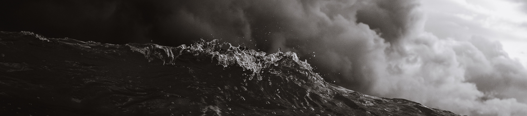 Black and white photo of waves crashing Black and white photo of waves crashing