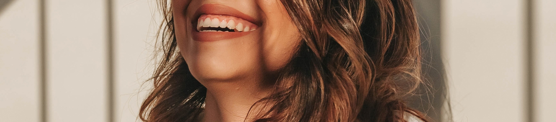 A close up of a women's mouth laughing A close up of a women's mouth laughing
